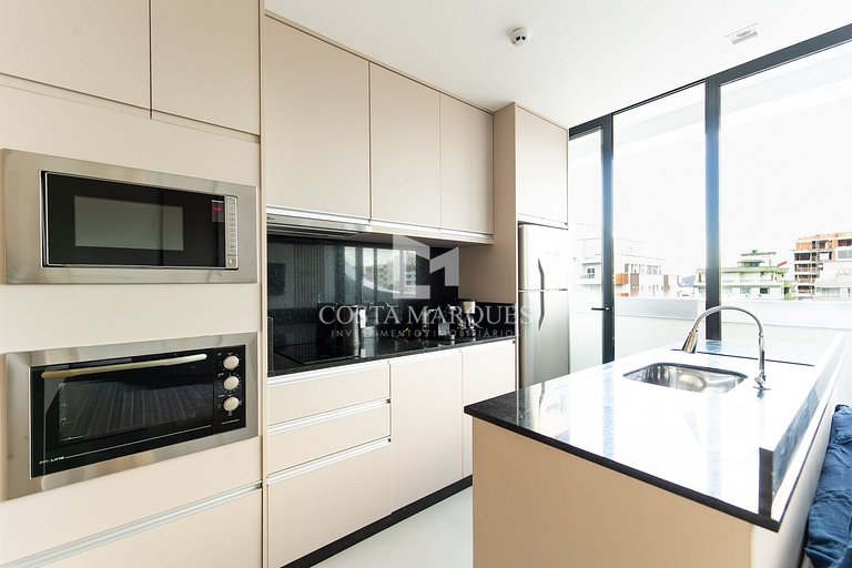 Flat com piscina em Bombas / SC