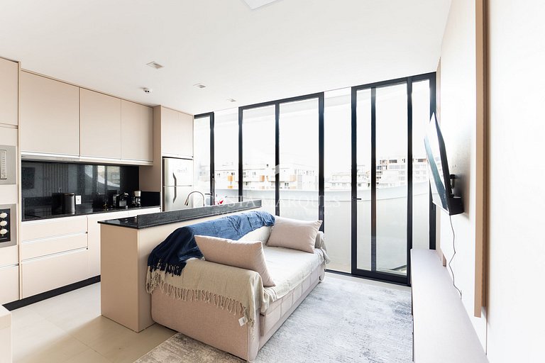 Flat com piscina em Bombas / SC