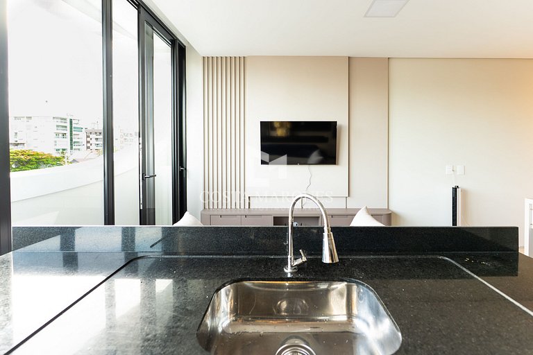 Flat com piscina em Bombas / SC