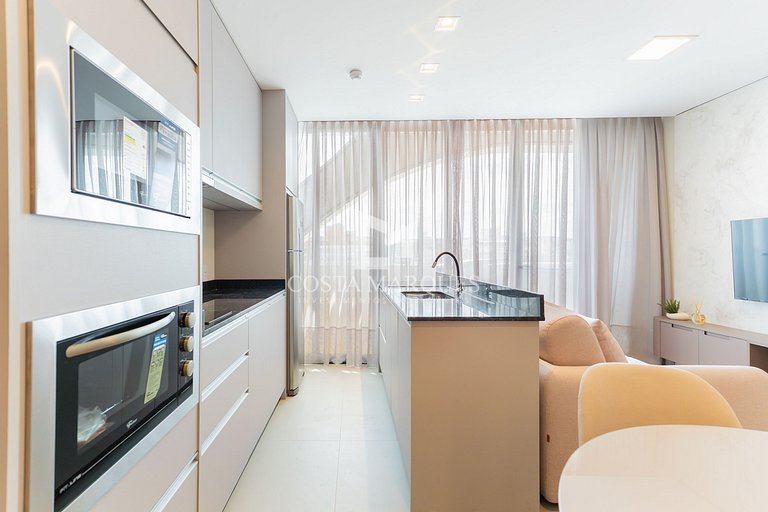 Flat com piscina em Bombas / SC