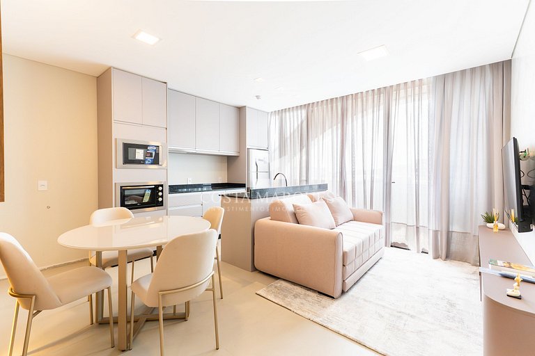 Flat com piscina em Bombas / SC