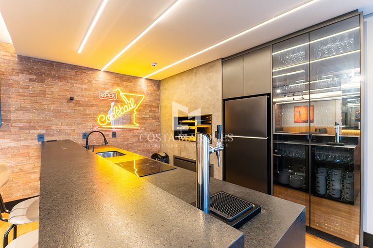 Flat com piscina em Bombas / SC